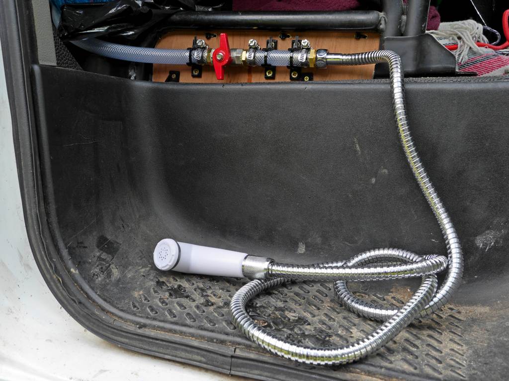 a shower head near the passenger seat